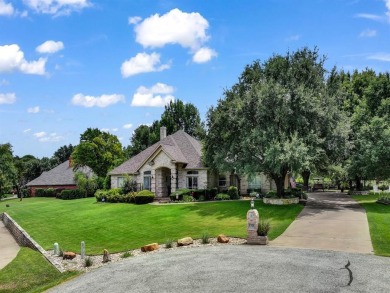 Welcome to 9705 Argyle Court -- a meticulously cared-for home on Pecan Plantation Country Club in Texas - for sale on GolfHomes.com, golf home, golf lot
