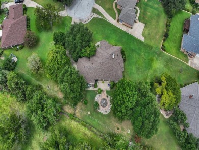 Welcome to 9705 Argyle Court -- a meticulously cared-for home on Pecan Plantation Country Club in Texas - for sale on GolfHomes.com, golf home, golf lot