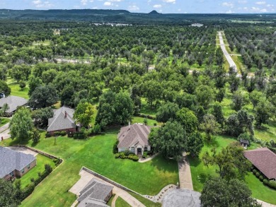 Welcome to 9705 Argyle Court -- a meticulously cared-for home on Pecan Plantation Country Club in Texas - for sale on GolfHomes.com, golf home, golf lot