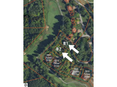 Surrounded by the lush green 3rd fairway of The Legend Golf on Shanty Creek Golf Course in Michigan - for sale on GolfHomes.com, golf home, golf lot
