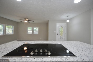 Welcome to 118 Turtle Cove Trwy - a completely renovated on Turtle Cove Golf Course in Georgia - for sale on GolfHomes.com, golf home, golf lot