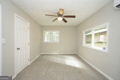 Welcome to 118 Turtle Cove Trwy - a completely renovated on Turtle Cove Golf Course in Georgia - for sale on GolfHomes.com, golf home, golf lot