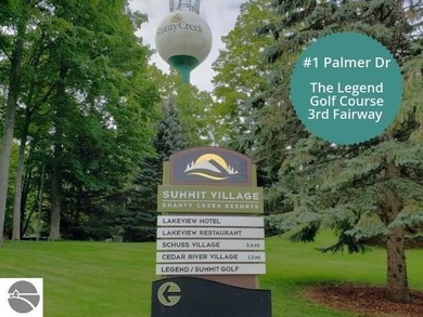 Surrounded by the lush green 3rd fairway of The Legend Golf on Shanty Creek Golf Course in Michigan - for sale on GolfHomes.com, golf home, golf lot