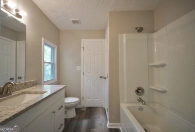 Welcome to 118 Turtle Cove Trwy - a completely renovated on Turtle Cove Golf Course in Georgia - for sale on GolfHomes.com, golf home, golf lot