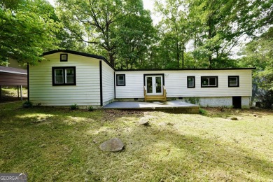 Welcome to 118 Turtle Cove Trwy - a completely renovated on Turtle Cove Golf Course in Georgia - for sale on GolfHomes.com, golf home, golf lot