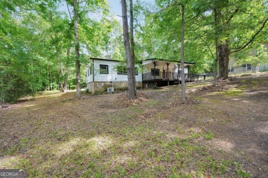 Welcome to 118 Turtle Cove Trwy - a completely renovated on Turtle Cove Golf Course in Georgia - for sale on GolfHomes.com, golf home, golf lot