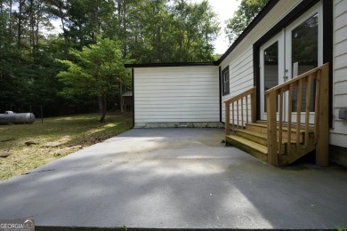 Welcome to 118 Turtle Cove Trwy - a completely renovated on Turtle Cove Golf Course in Georgia - for sale on GolfHomes.com, golf home, golf lot