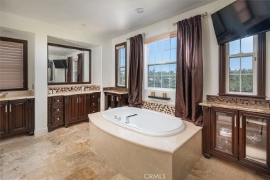 Call Listing Agent Holly Thompson, RE/MAX of Santa Clarita for a on Valencia Country Club in California - for sale on GolfHomes.com, golf home, golf lot