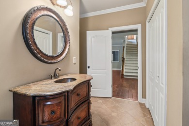 This exquisite Traditional Craftsman home rests near the end of on Traditions of Braselton Golf Club in Georgia - for sale on GolfHomes.com, golf home, golf lot