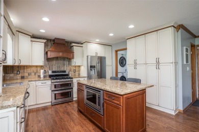 Welcome home to this beautiful 5 bed, 4 bath, well maintained on Copper Creek Golf Course in Iowa - for sale on GolfHomes.com, golf home, golf lot
