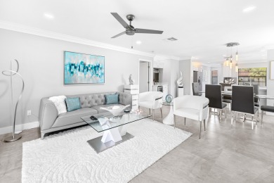 Stunningly renovated 2BR/2BA corner unit in Boca Lago, offering on Boca Lago Golf and Country Club in Florida - for sale on GolfHomes.com, golf home, golf lot