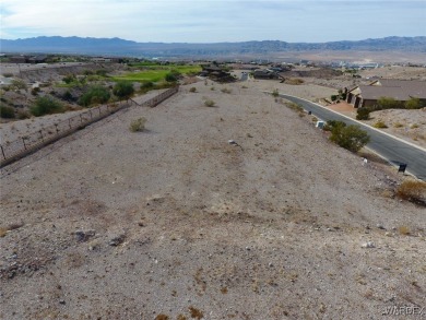 This private homesite offers views of the golf course and on Laughlin Ranch Golf Club in Arizona - for sale on GolfHomes.com, golf home, golf lot