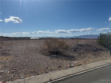 This private homesite offers views of the golf course and on Laughlin Ranch Golf Club in Arizona - for sale on GolfHomes.com, golf home, golf lot