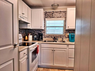 Beautiful 2BR/2BA Turn-Key Home in Rolling Greens Village on Rolling Greens Executive Golf Community in Florida - for sale on GolfHomes.com, golf home, golf lot