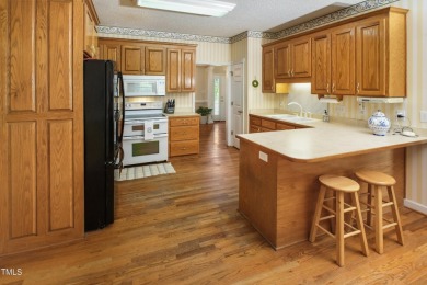 WELCOME to a RANCH-style home FULL of CHARM! If you are seeking on TimberLake Golf Club in North Carolina - for sale on GolfHomes.com, golf home, golf lot