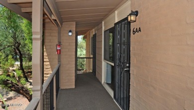 Lovely light and bright 2 bed/2bath corner, upstairs condominium on Oro Valley Country Club in Arizona - for sale on GolfHomes.com, golf home, golf lot