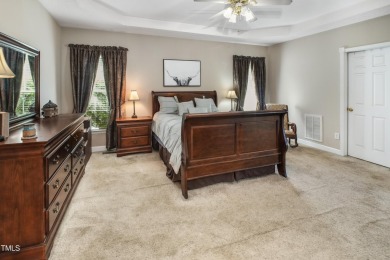 WELCOME to a RANCH-style home FULL of CHARM! If you are seeking on TimberLake Golf Club in North Carolina - for sale on GolfHomes.com, golf home, golf lot