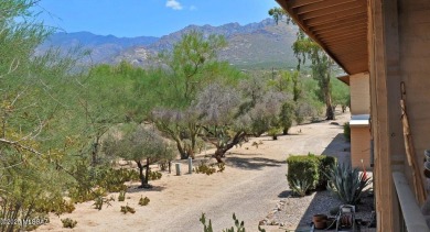 Lovely light and bright 2 bed/2bath corner, upstairs condominium on Oro Valley Country Club in Arizona - for sale on GolfHomes.com, golf home, golf lot