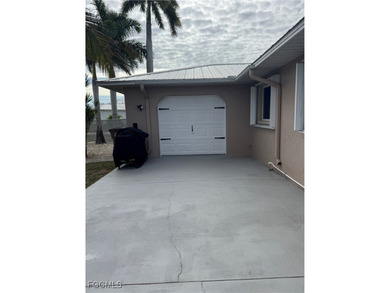 Discover Florida waterfront living at its finest in this on Burnt Store Golf Club in Florida - for sale on GolfHomes.com, golf home, golf lot