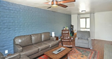Lovely light and bright 2 bed/2bath corner, upstairs condominium on Oro Valley Country Club in Arizona - for sale on GolfHomes.com, golf home, golf lot