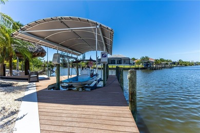 Discover Florida waterfront living at its finest in this on Burnt Store Golf Club in Florida - for sale on GolfHomes.com, golf home, golf lot