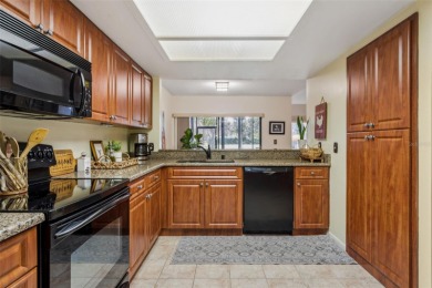 GOLF COURSE VIEWS! Desirable CARROLLWOOD VILLAGE condo/townhome on Carrollwood Country Club in Florida - for sale on GolfHomes.com, golf home, golf lot