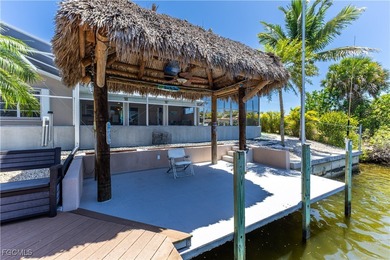 Discover Florida waterfront living at its finest in this on Burnt Store Golf Club in Florida - for sale on GolfHomes.com, golf home, golf lot