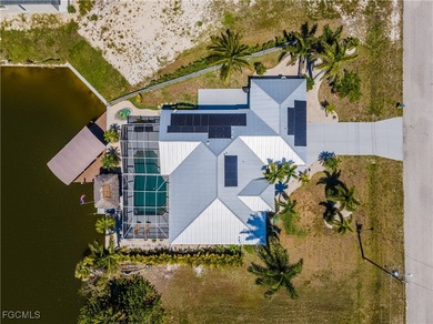 Discover Florida waterfront living at its finest in this on Burnt Store Golf Club in Florida - for sale on GolfHomes.com, golf home, golf lot