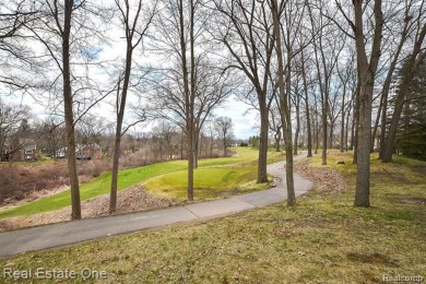 Looking to live in the area's premier golf course community on Oak Pointe Country Club in Michigan - for sale on GolfHomes.com, golf home, golf lot