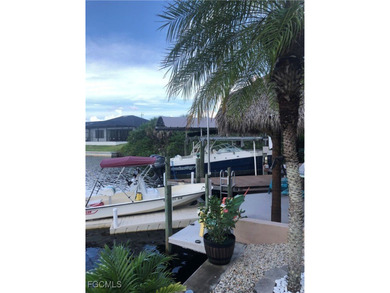 Discover Florida waterfront living at its finest in this on Burnt Store Golf Club in Florida - for sale on GolfHomes.com, golf home, golf lot