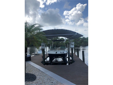 Discover Florida waterfront living at its finest in this on Burnt Store Golf Club in Florida - for sale on GolfHomes.com, golf home, golf lot