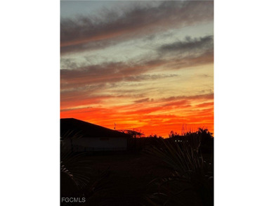 Discover Florida waterfront living at its finest in this on Burnt Store Golf Club in Florida - for sale on GolfHomes.com, golf home, golf lot