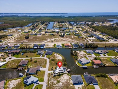 Discover Florida waterfront living at its finest in this on Burnt Store Golf Club in Florida - for sale on GolfHomes.com, golf home, golf lot