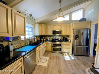 Experience comfortable living in this spacious all-brick home on Beaver Brook Golf and Country Club in Tennessee - for sale on GolfHomes.com, golf home, golf lot