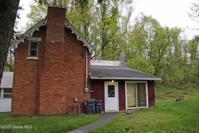 This is a Unique home on a very private 2.5 acre lot offering on Hoosick Falls Country Club in New York - for sale on GolfHomes.com, golf home, golf lot
