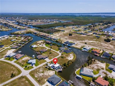 Discover Florida waterfront living at its finest in this on Burnt Store Golf Club in Florida - for sale on GolfHomes.com, golf home, golf lot