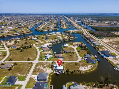 Discover Florida waterfront living at its finest in this on Burnt Store Golf Club in Florida - for sale on GolfHomes.com, golf home, golf lot