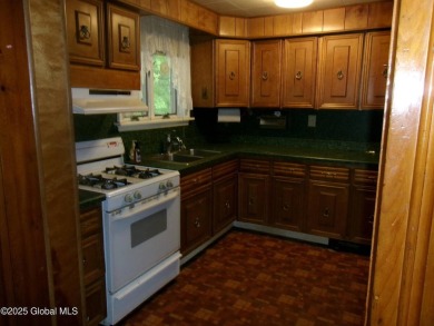 This is a Unique home on a very private 2.5 acre lot offering on Hoosick Falls Country Club in New York - for sale on GolfHomes.com, golf home, golf lot