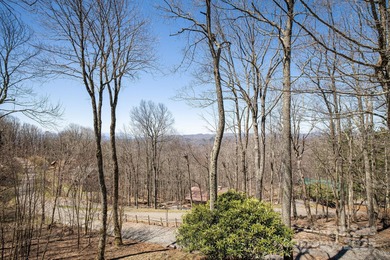 Within the picturesque mountains of Western North Carolina on Wolf Laurel Country Club in North Carolina - for sale on GolfHomes.com, golf home, golf lot