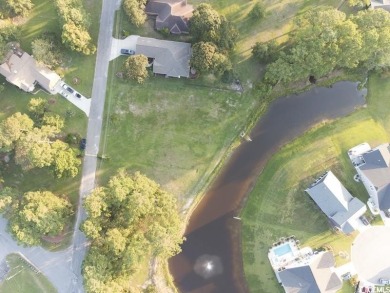 This rare lot offers the perfect setting to build your dream on Eagle Nest Golf Club in South Carolina - for sale on GolfHomes.com, golf home, golf lot
