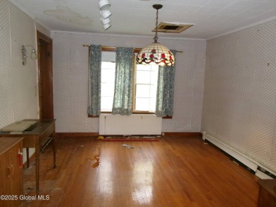 This is a Unique home on a very private 2.5 acre lot offering on Hoosick Falls Country Club in New York - for sale on GolfHomes.com, golf home, golf lot