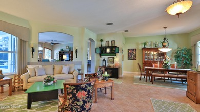 Warm and inviting 4 BR pool home with lake and fountain view on Plantation Bay Golf and Country Club in Florida - for sale on GolfHomes.com, golf home, golf lot