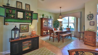 Warm and inviting 4 BR pool home with lake and fountain view on Plantation Bay Golf and Country Club in Florida - for sale on GolfHomes.com, golf home, golf lot