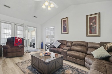 Welcome home to this well-maintained three-bedroom, two-bathroom on The Hackler Course at Coastal Carolina University in South Carolina - for sale on GolfHomes.com, golf home, golf lot