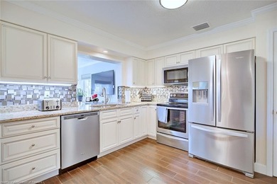 Welcome to this beautifully maintained 3-bedroom, 2-bathroom on River Greens Golf Course in Florida - for sale on GolfHomes.com, golf home, golf lot