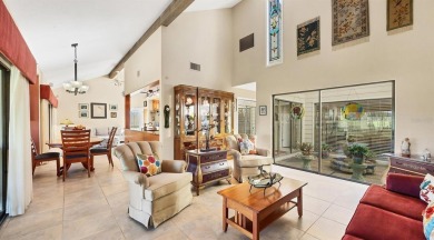 Beautifully updated villa with spectacular golf views in The on The Meadows Golf and Country Club in Florida - for sale on GolfHomes.com, golf home, golf lot