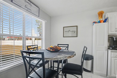 Welcome home to this well-maintained three-bedroom, two-bathroom on The Hackler Course at Coastal Carolina University in South Carolina - for sale on GolfHomes.com, golf home, golf lot