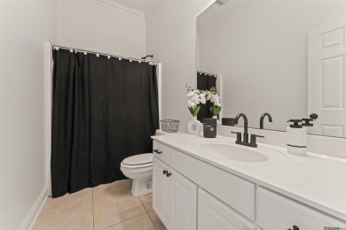 Welcome to effortless living in the highly sought-after Pelican on Pelican Point Golf Club in Louisiana - for sale on GolfHomes.com, golf home, golf lot
