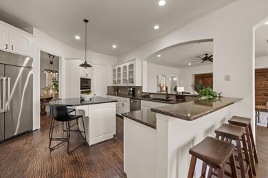 Welcome to this exquisite property! Nestled inside the on Hackberry Creek Country Club in Texas - for sale on GolfHomes.com, golf home, golf lot