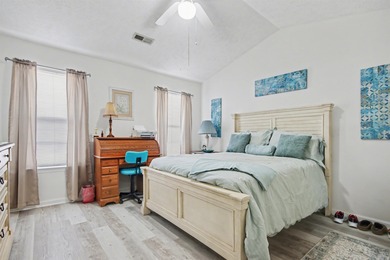 Welcome home to this well-maintained three-bedroom, two-bathroom on The Hackler Course at Coastal Carolina University in South Carolina - for sale on GolfHomes.com, golf home, golf lot